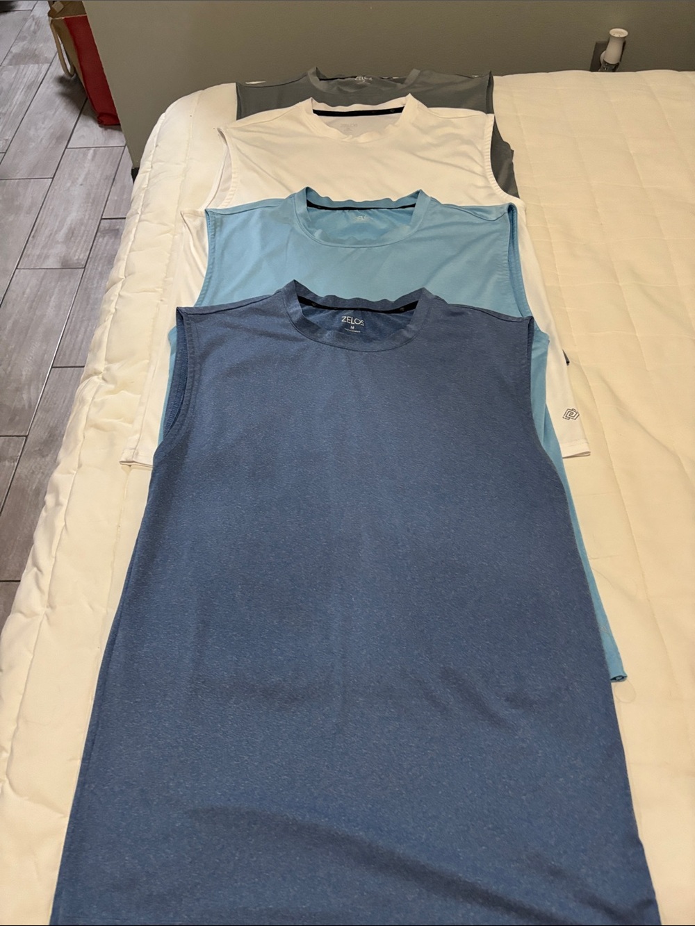 (4) Zelos Sleeveless Athletic Tank Bundle in Navy, Light Blue, White, and Grey